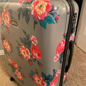 Matilda Jane never been used-rolling suitcase